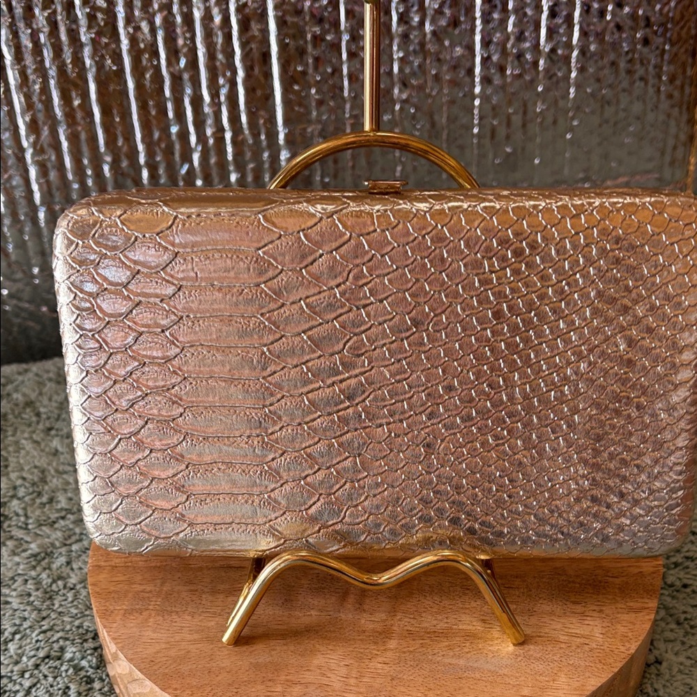 Metallic silver clutch 3D embossed texture